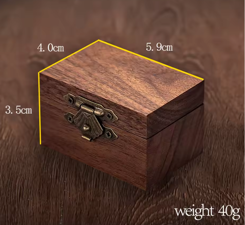 Wooden box with dimensions and weight displayed on a wooden surface