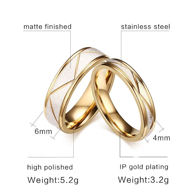 Two gold rings with specifications on a white background