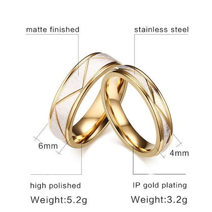 Two gold rings with specifications on a white background