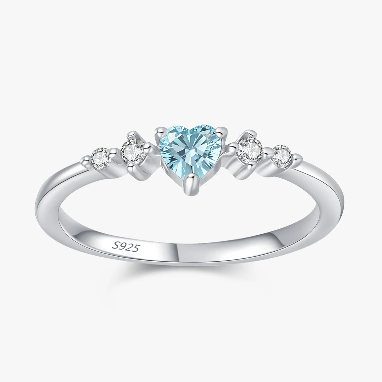 sterling silver womens promise ring with a heart-shaped sky blue gemstone