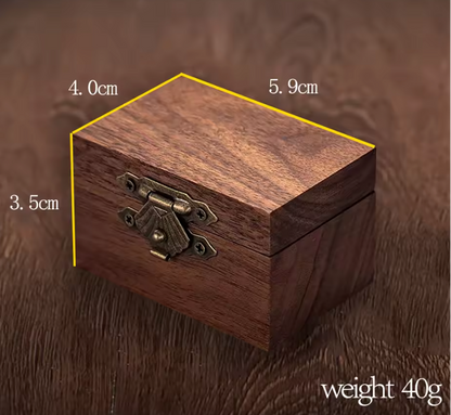Wooden box with dimensions and weight displayed on a wooden surface