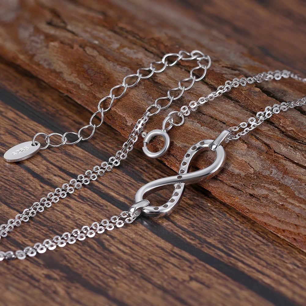 Infinity Symbol With Paved CZ Stones 0.925 Sterling Silver Adjustable Bracelet (3 Colors)