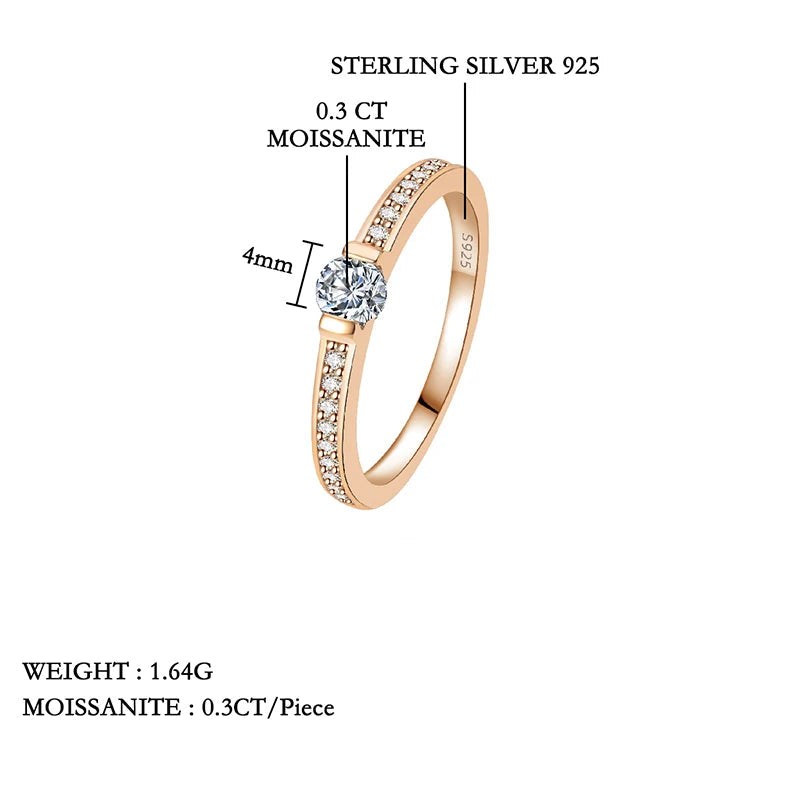 Rose gold ring with gemstones on a white background