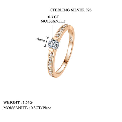 Rose gold ring with gemstones on a white background