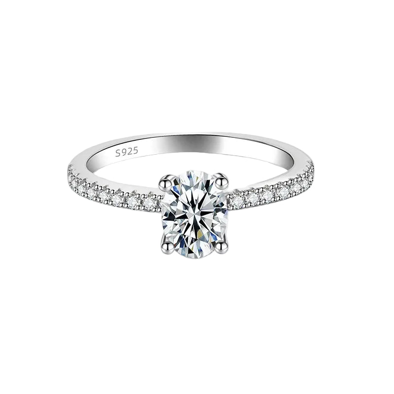 Silver ring with a diamond on a white background,
