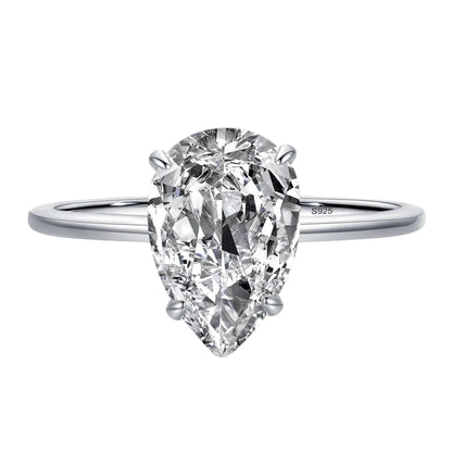 A pear-cut cubic zirconia engagement ring in a silver-toned band